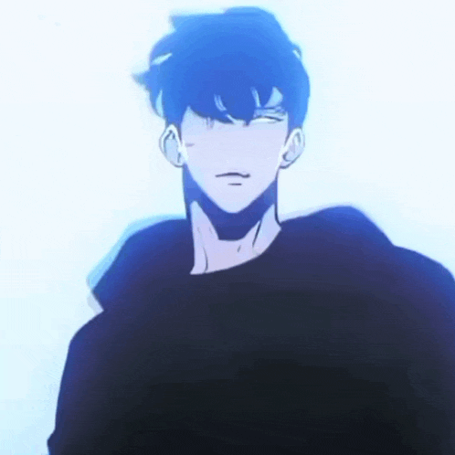 a man with blue hair and a black shirt is standing in front of a blue background .