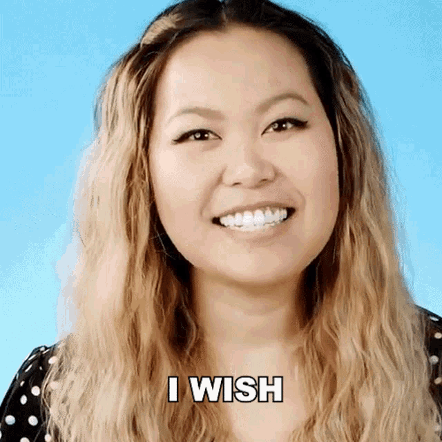 a woman with braces on her teeth is smiling and says i wish