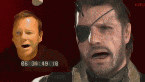 a man with a beard and an eye patch is looking at another man with his mouth open .