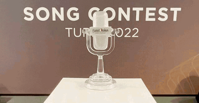 a trophy for the eurovision song contest is on display