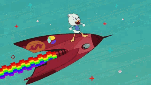 a cartoon duck is riding on the back of a rocket with a rainbow coming out of it .