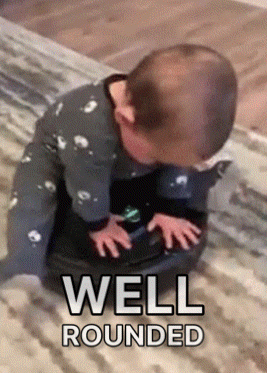 a baby is crawling on a rug with the words well rounded written below it