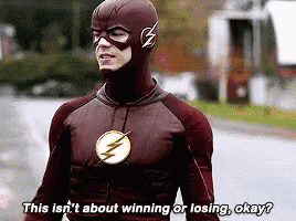 a man in a flash costume says this isn 't about winning or losing , okay .