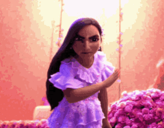 a girl in a purple dress is standing in front of a bunch of pink flowers