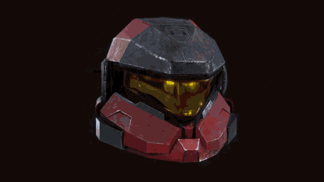 a red and black object with a yellow light on the side