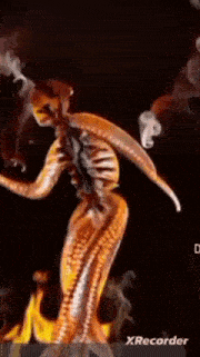 a skeleton of an octopus is dancing on a stage .