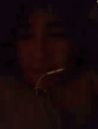a person wearing headphones with a yellow circle around it