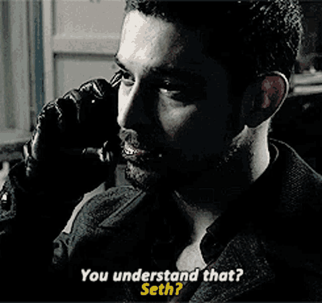 a man talking on a cell phone with the words you understand that seth