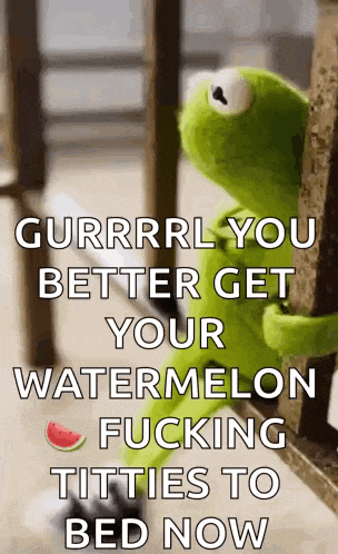 a kermit the frog is leaning against a railing with a watermelon on it