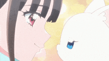 a close up of a girl 's face with a cat behind her