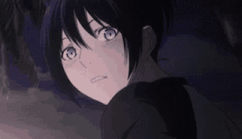 a close up of a anime character with blue eyes and black hair .
