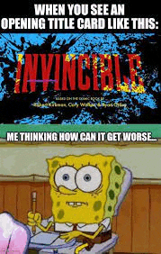 spongebob is sitting at a desk in front of a comic book cover .
