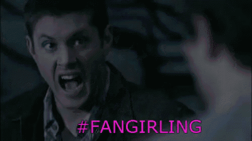 a man is yelling at another man with the hashtag #fangirling on the bottom