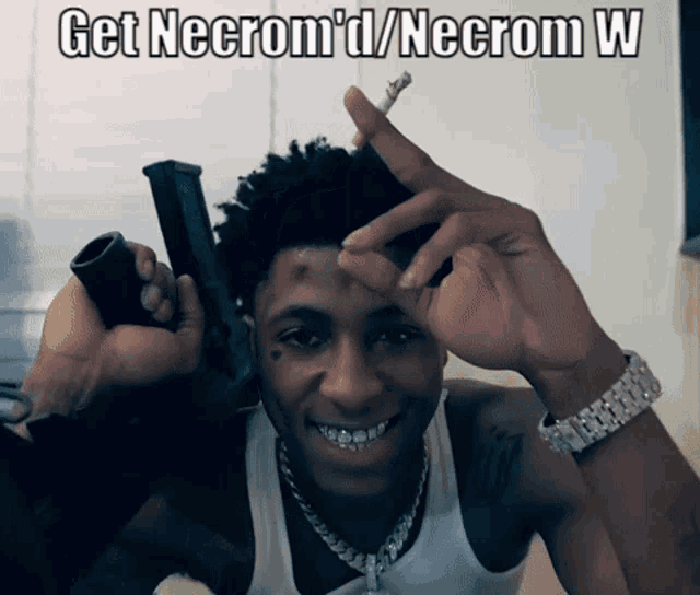 a man holding a gun and a cigarette with the words get necrom 'd / necrom w on the bottom