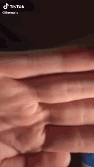 a close up of a person 's hand with a tiktok watermark on it