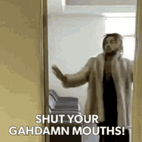 a woman in a fur coat is standing in a doorway and says `` shut your gahdamn mouths ! ''