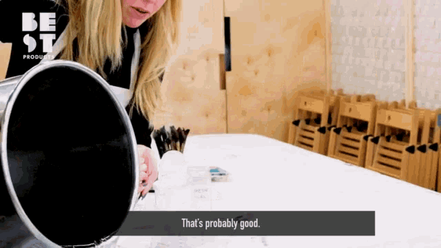 a woman looking at herself in a mirror with the words that 's probably good on the bottom