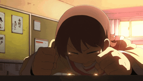 a girl laying down with her eyes closed in front of a bulletin board with japanese writing on it