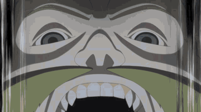 a close up of a person 's face with a large mouth