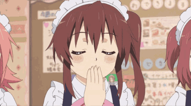 a girl in a maid outfit covering her mouth with her hands