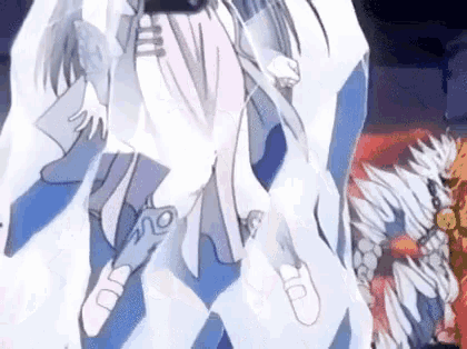 a couple of anime characters are standing next to each other on a stage in a dark room .
