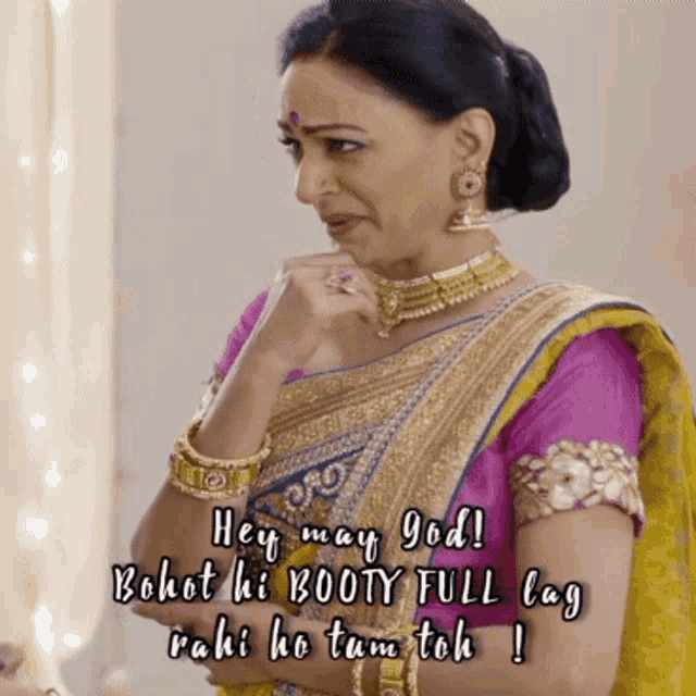 a woman in a purple and gold saree says hey may god bohot ki booty full lag rahi ho tum toh