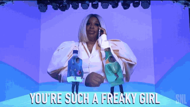 a woman talking on a cell phone next to a bottle of water and the words you 're such a freaky girl below her