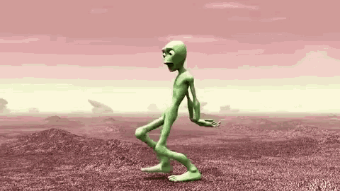 a green cartoon character is dancing in the desert .