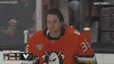 a hockey player wearing the number 36 jersey