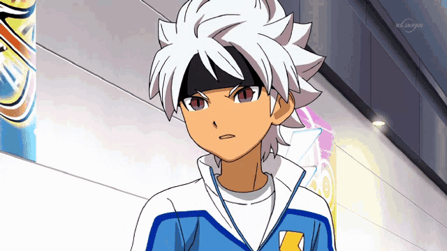 a boy with white hair and purple eyes is standing in front of a tv screen that says tokyo