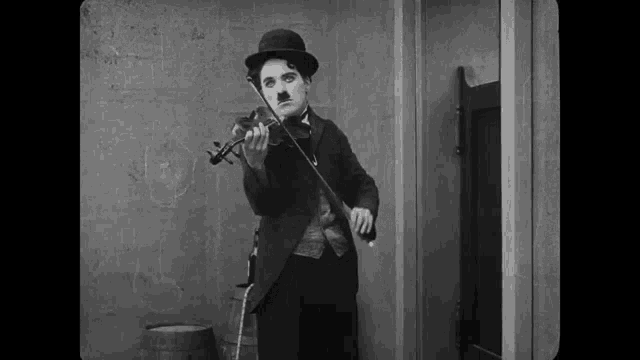 Chaplin Violin GIF - Chaplin Violin GIFs