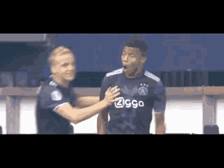 a soccer player wearing a jersey that says ziggo