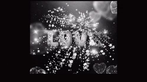a black and white photo of the word love surrounded by hearts