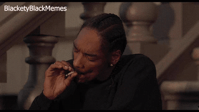 snoop dogg smoking a cigarette in front of a staircase with the caption blacketyblackmemes