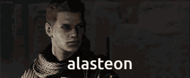 a man with a scarf around his neck has the word alasteon on his chest