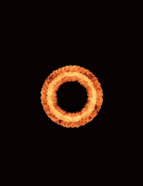 a large fireball with a hole in the middle of it