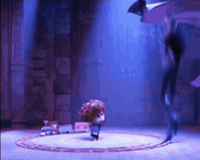 a cartoon character is standing on a stage in front of a purple background .