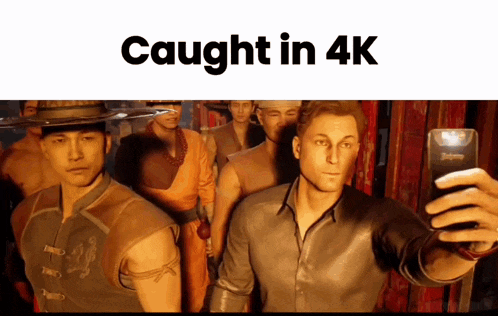 a man taking a selfie with the words caught in 4k on the bottom