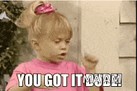 a little girl is making a funny face and saying `` you got it ! ''