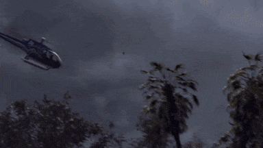 a t-rex is attacking a car in a video game scene
