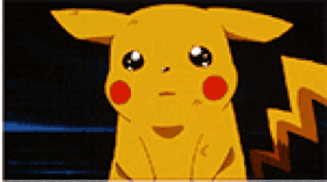 a close up of a pikachu with a sad look on its face