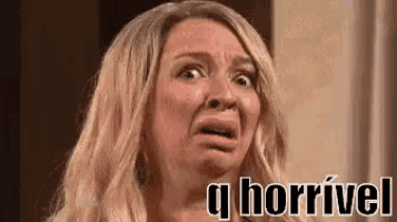 a woman is making a funny face with her mouth open and the words `` q horrivel '' written above her .