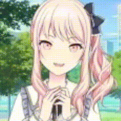 a girl with long pink hair is holding a microphone and smiling .
