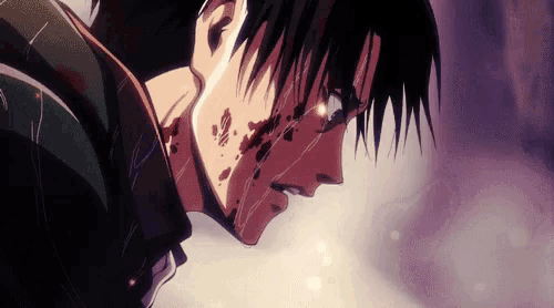 a close up of a person 's face with blood coming out of it .
