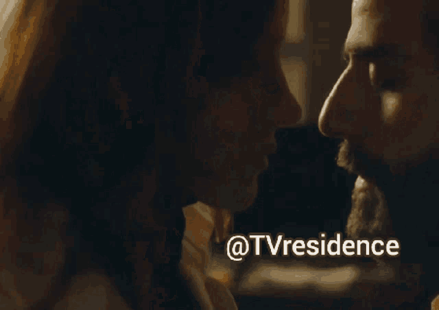 a close up of a man and woman kissing with the words @tvresidence below