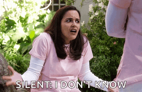 a woman in a pink scrub top says silent i don t know