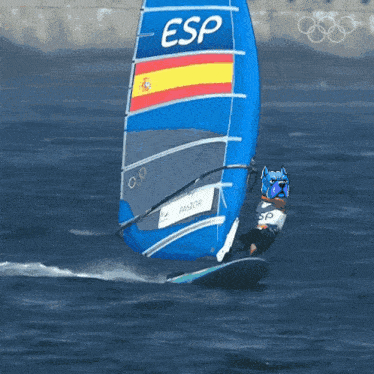 a sailboat with esp on the sail is in the ocean