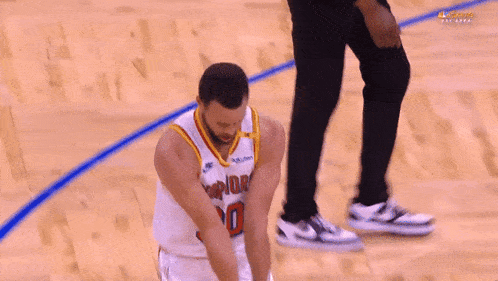 a basketball player wearing a number 30 jersey