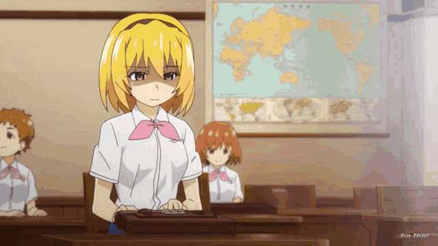 a girl in a classroom with a map in the background