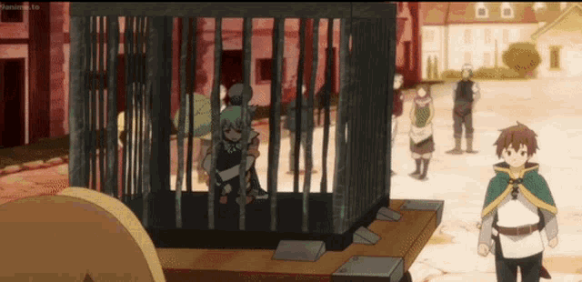 a girl is sitting in a cage with a man standing behind her